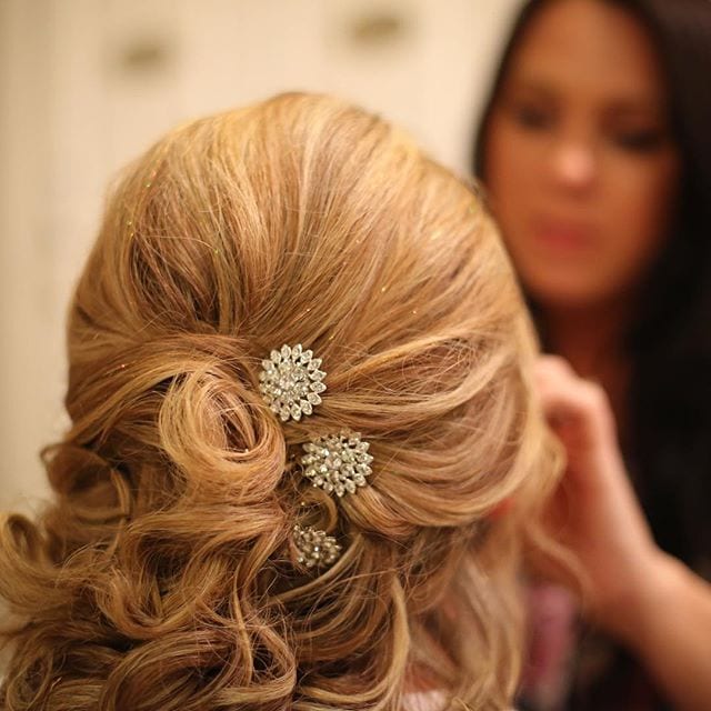 Bridal hair styling for wedding and makeup blonde