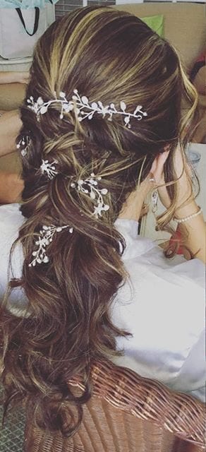 Brown hair down with flowers hair style